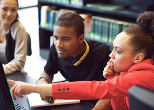 Students looking up information online